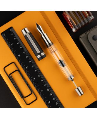 Conid Kingsize Demonstrator Bulkfiller – Demonstrator Barrel – Flat Top Delrin Cap – Titanium Vulpen